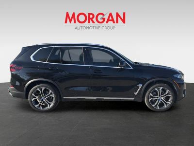 2025 BMW X5 — rear three-quarter view