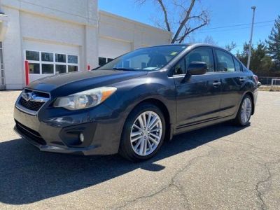 2014 Subaru Impreza 2.0i Limited in Dark Gray Metallic — front three-quarter view