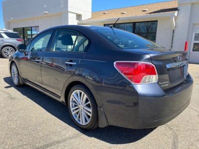 2014 Subaru Impreza — rear three-quarter view