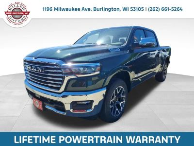 2026 RAM Ram 1500 RAM 1500 LARAMIE CREW CAB 4X4 5'7' BOX in Serrano-Green Metallic Exterior Paint — front three-quarter view