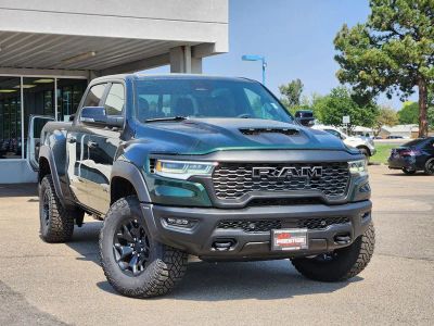 2026 RAM 1500 RAM 1500 RHO CREW CAB 4X4 5'7' BOX in Serrano-Green Metallic Exterior Paint — front three-quarter view