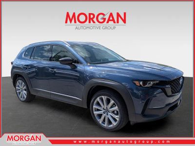 2026 Mazda CX-50 2.5 S Premium in Ingot Blue Metallic — front three-quarter view