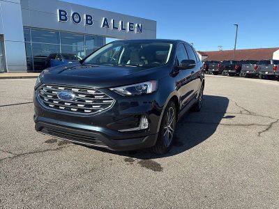 2023 Ford Edge Titanium in Stone Blue — front three-quarter view
