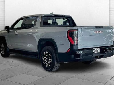 2026 GMC Sierra EV — rear three-quarter view