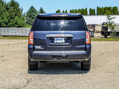 2018 GMC Yukon — rear three-quarter view
