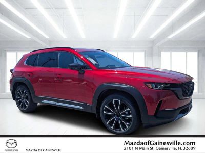 2026 Mazda CX-50 2.5 Turbo Premium Plus in Red — front three-quarter view