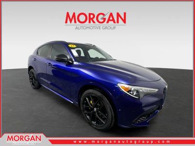 2021 Alfa Romeo Stelvio Ti in Anodized Blue Metallic — front three-quarter view