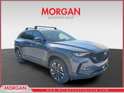 2026 Mazda CX-50 Hybrid Premium Plus in Polymetal Gray Metallic — front three-quarter view