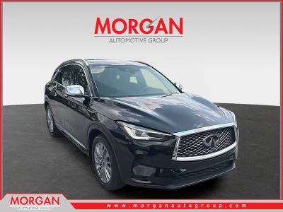 2024 INFINITI QX50 LUXE in Black Obsidian — front three-quarter view