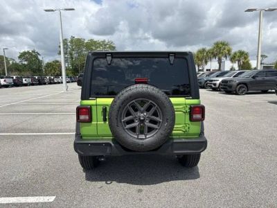 2026 Jeep Wrangler — rear three-quarter view