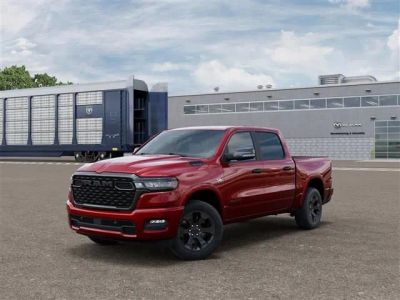 2026 RAM Ram 1500 RAM 1500 BIG HORN CREW CAB 4X4 5'7' BOX in Molten Red Pearl-Coat Exterior Paint — front three-quarter view