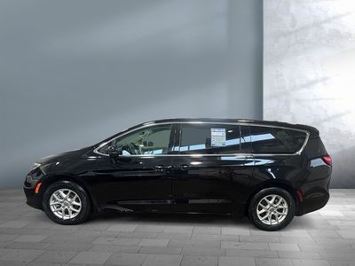 2024 Chrysler Pacifica — rear three-quarter view
