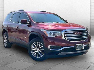 2018 GMC Acadia SLE in Crimson Red Tintcoat — front three-quarter view