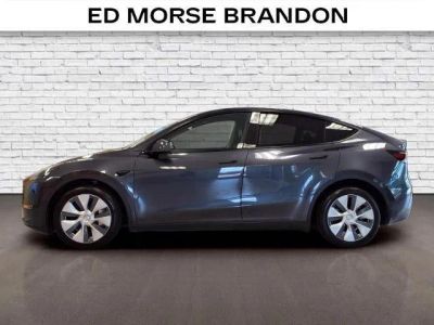 2024 Tesla Model Y — side profile view