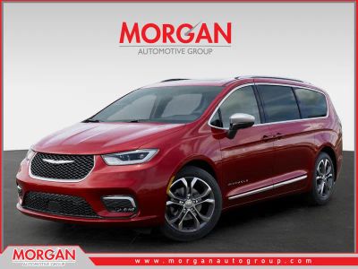 2026 Chrysler Pacifica Pinnacle in Red — front three-quarter view