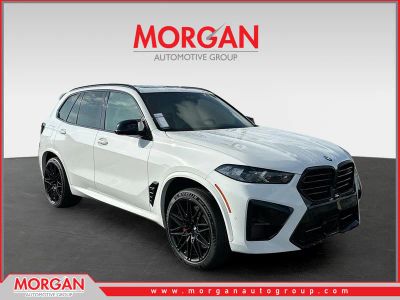 2026 BMW X5 M Competition in White — front three-quarter view