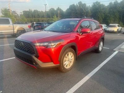 2022 Toyota Corolla Cross LE in Barcelona Red Metallic — front three-quarter view