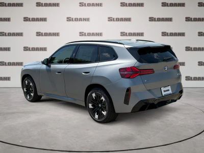 2026 BMW X3 — rear three-quarter view