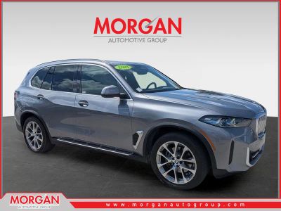 2024 BMW X5 xDrive40i in Skyscraper Gray Metallic — front three-quarter view