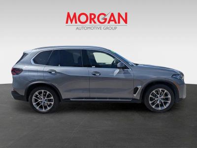 2024 BMW X5 — rear three-quarter view