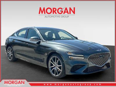2022 Genesis G70 2.0T in Black Forest Green — front three-quarter view