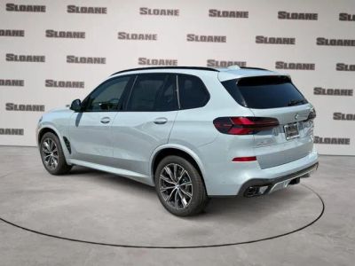 2026 BMW X5 — rear three-quarter view