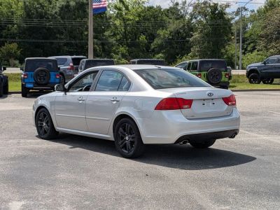 2010 Kia Optima — rear three-quarter view