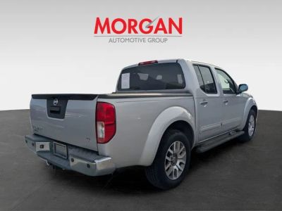 2013 Nissan Frontier — rear three-quarter view