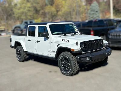 2026 Jeep Gladiator GLADIATOR WILLYS 4X4 in Bright White Clear-Coat Exterior Paint — front three-quarter view