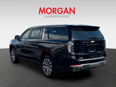 2025 Chevrolet Suburban — rear three-quarter view