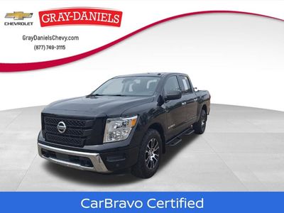 2021 Nissan Titan SV in Super Black — front three-quarter view