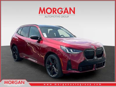 2026 BMW X3 M50 xDrive in Red — front three-quarter view