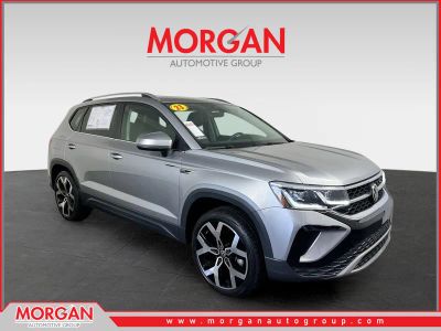 2023 Volkswagen Taos 1.5T SEL in Pyrite Silver Metallic — front three-quarter view
