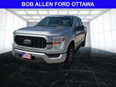 2022 Ford F-150 XL in Iconic Silver — front three-quarter view