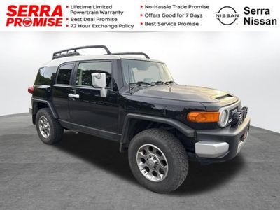 2012 Toyota FJ Cruiser 4x2 AT in Black — front three-quarter view