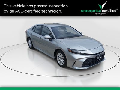 2025 Toyota Camry LE — front three-quarter view