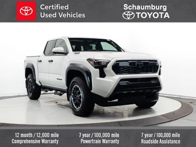 2025 Toyota Tacoma Hybrid TRD Off Road in White — front three-quarter view