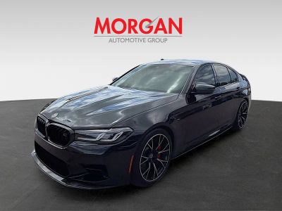 2023 BMW M5 — rear three-quarter view
