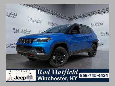 2023 Jeep Compass Trailhawk 4x4 in Laser Blue Pearlcoat — front three-quarter view