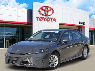 2025 Toyota Camry LE in Black — front three-quarter view