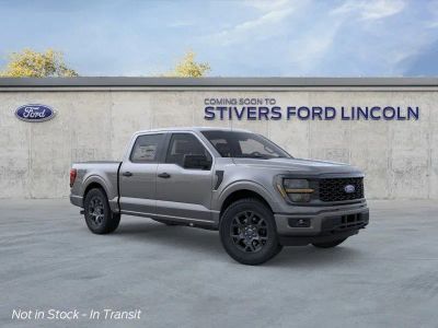 2026 Ford F-150 STX in Carbonized Gray Metallic — front three-quarter view
