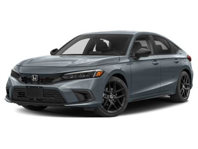 2024 Honda Civic Hatchback Sport in Rallye Red — front three-quarter view