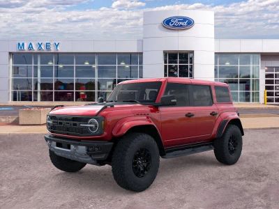 2026 Ford Bronco Raptor® in Ruby Red Metallic Tinted Clearcoat — front three-quarter view