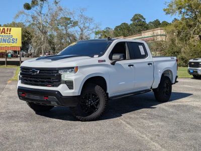 2023 Chevrolet Silverado 1500 LT Trail Boss in White — front three-quarter view