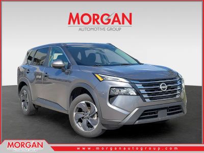 2024 Nissan Rogue SV in Gun Metallic — front three-quarter view