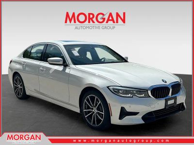 2021 BMW 3 Series 330i xDrive in Mineral White Metallic — front three-quarter view