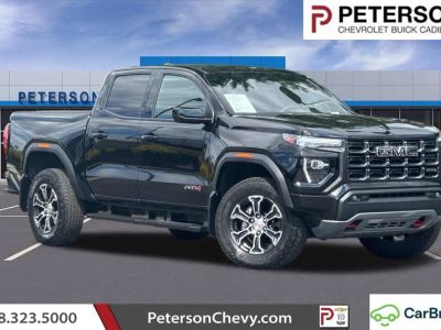 2025 GMC Canyon AT4 in Onyx Black — front three-quarter view