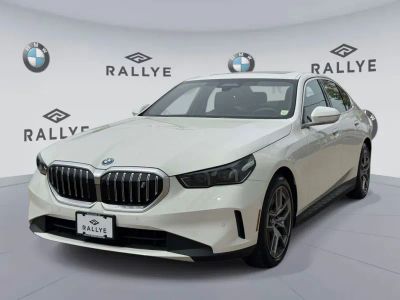 2025 BMW i5 — rear three-quarter view