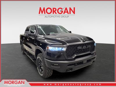 2026 Ram 1500 Rebel in Diamond Black Crystal Pearlcoat — front three-quarter view
