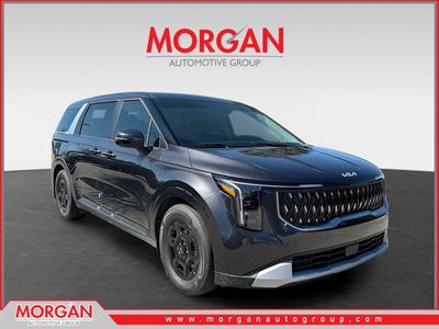 2026 Kia Carnival LXS in Panthera Metal — front three-quarter view